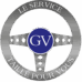 Logo GV sur emblème argenté : "Le Service Taillé Pour Vous". Symbole de qualité et d'expertise professionnelle sur mesure.